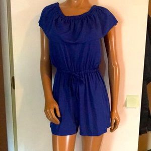 Blue Romper. On or off shoulders. Never worn. Medium.